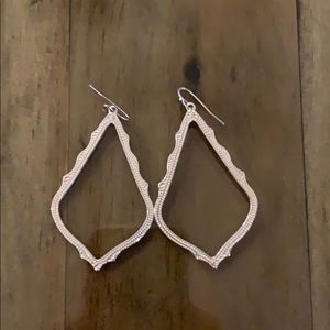 Kendra Scott silver metal large earrings.